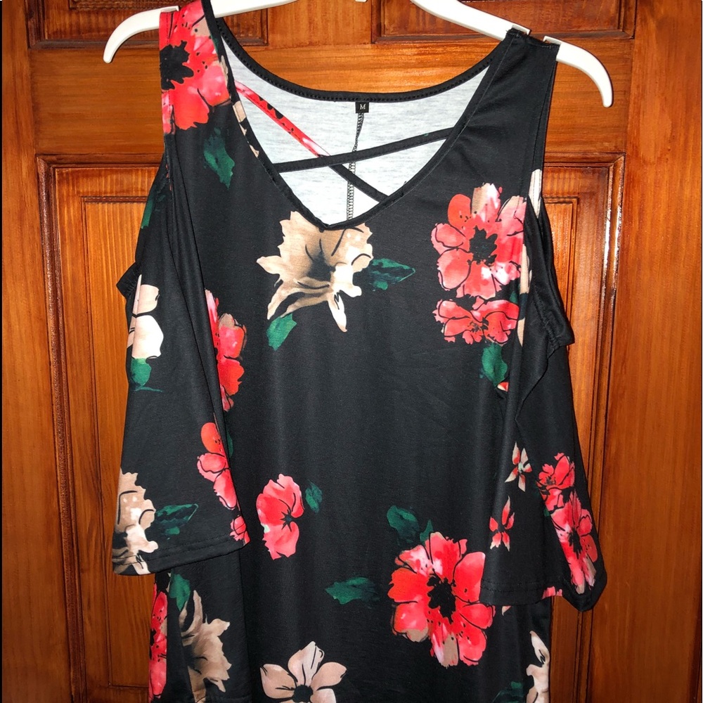 Brand new. Floral print with cold shoulder.